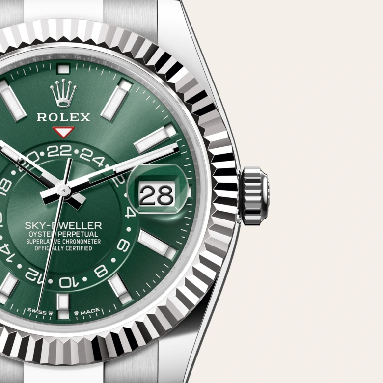 Rolex Sky-Dweller Oyster, 42 mm, Oystersteel jeklo in belo zlato, Nazobčan, dvosmerno vrtljiv Rolex Ring Command m336934-0001 pri Malalanu.webp